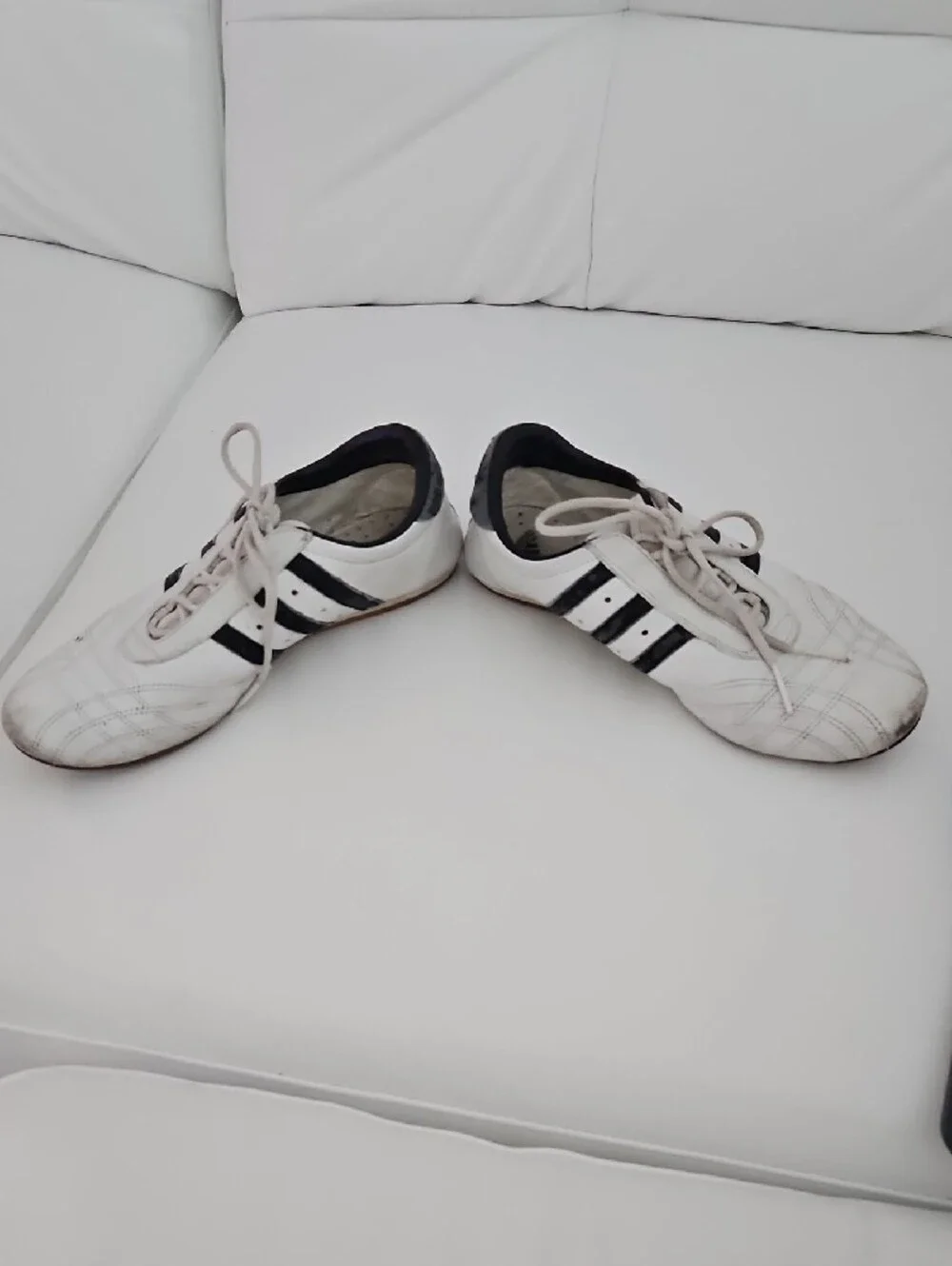 adidas Classic White Athletic Shoes with Black Stripes